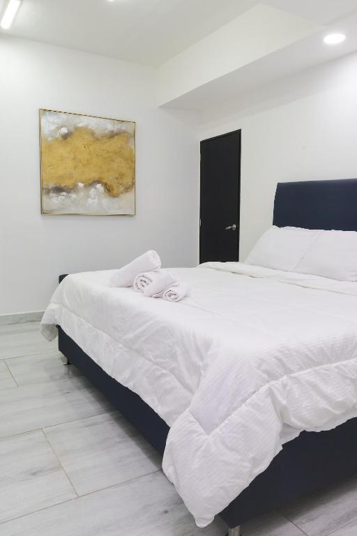 Postel nebo postele na pokoji v ubytování 33 HOTEL BOUTIQUE