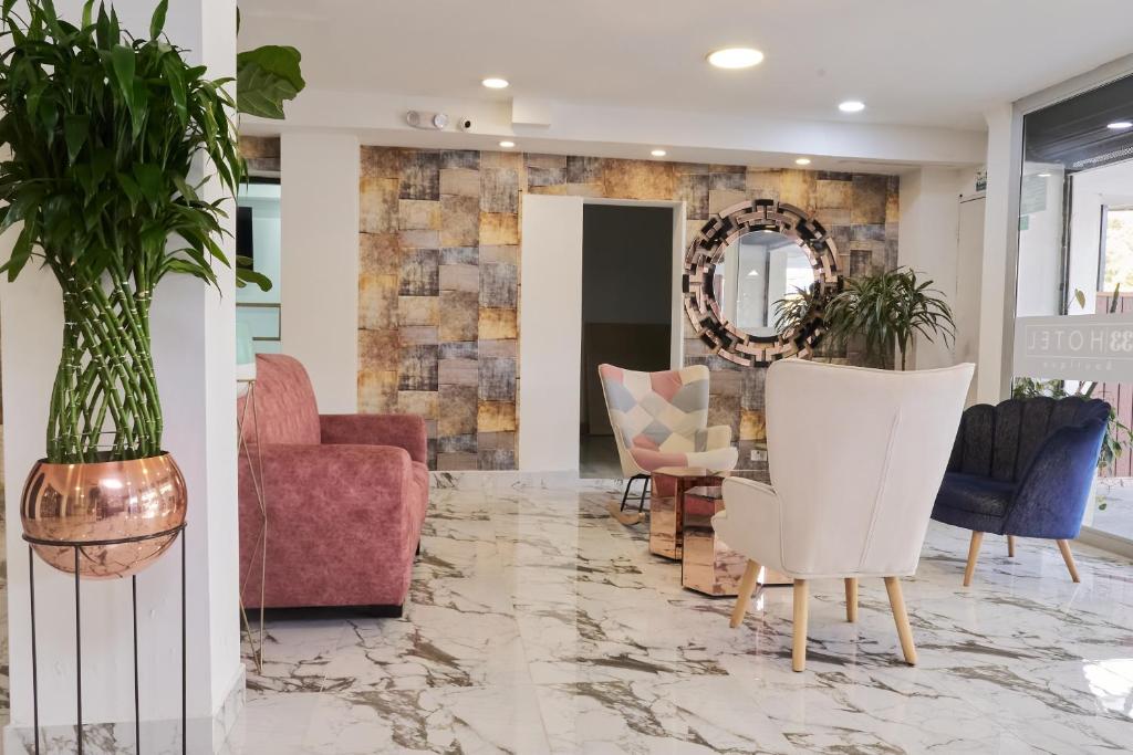 Posezení v ubytování 33 HOTEL BOUTIQUE