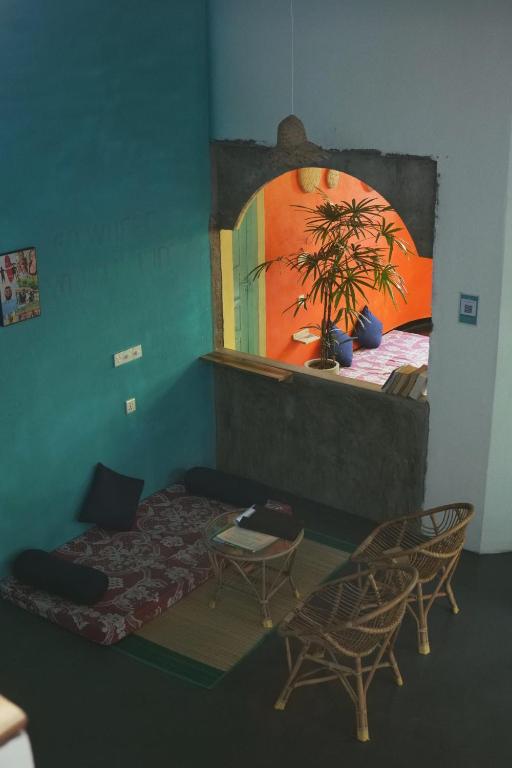 TV a/nebo společenská místnost v ubytování Dreamy Hostel Arugambay
