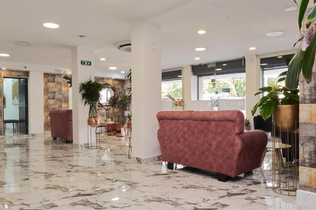 Posezení v ubytování 33 HOTEL BOUTIQUE