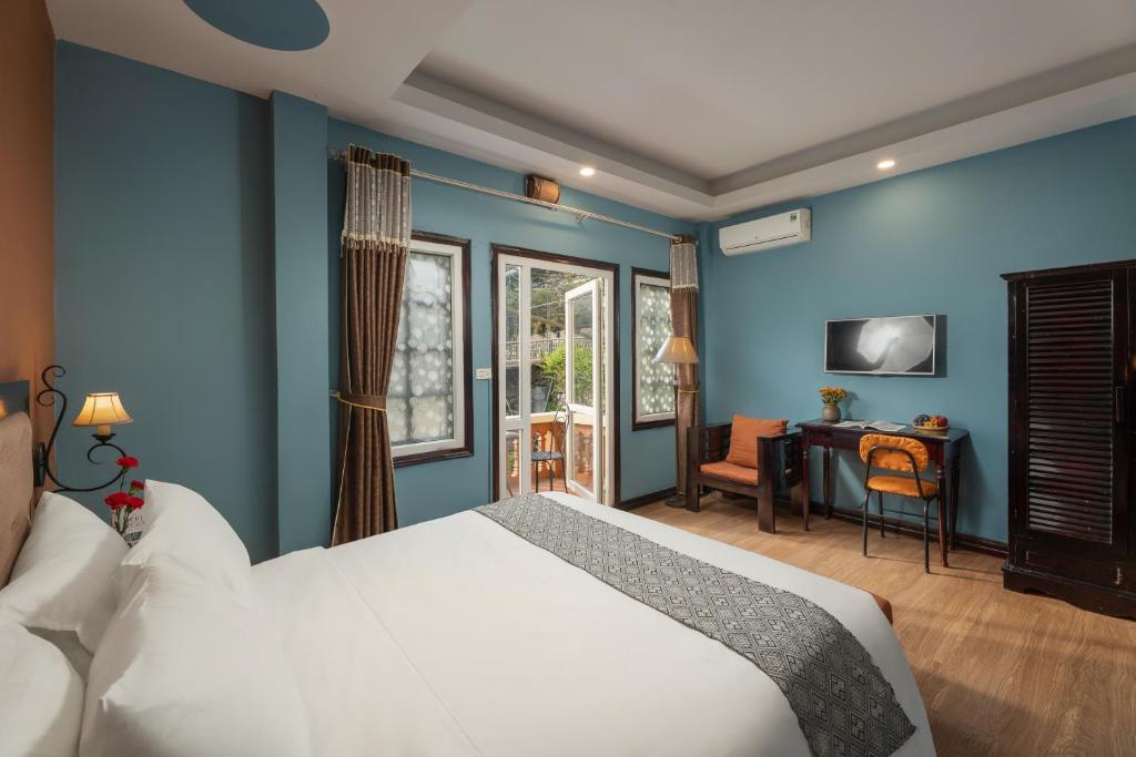 Giường trong phòng chung tại Sapa Fansipan View House
