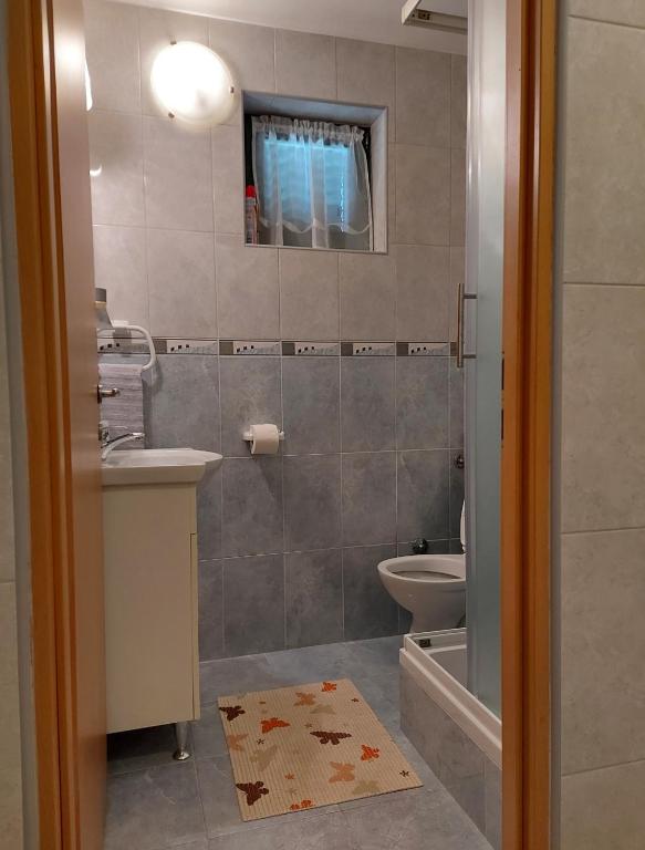 Łazienka w obiekcie Apartments Jeličić