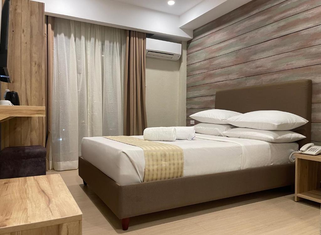 Postel nebo postele na pokoji v ubytování Sola Hotel