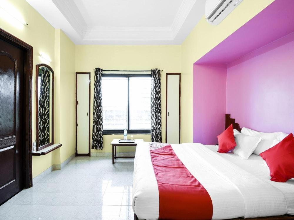 Katil atau katil-katil dalam bilik di Hotel Kalalaxmi lodging
