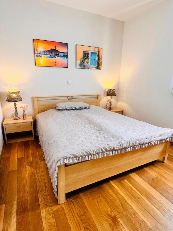 Postel nebo postele na pokoji v ubytování Apartment Aleks