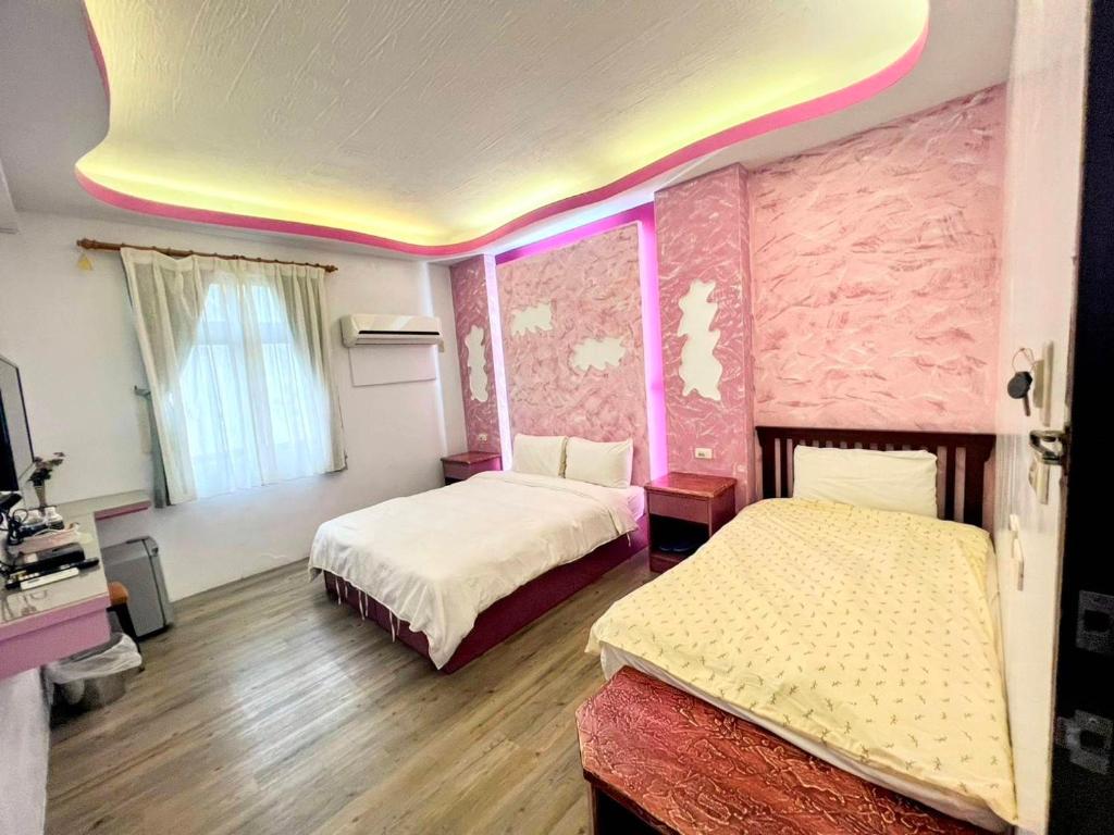 Postel nebo postele na pokoji v ubytování Country Kos Hostel