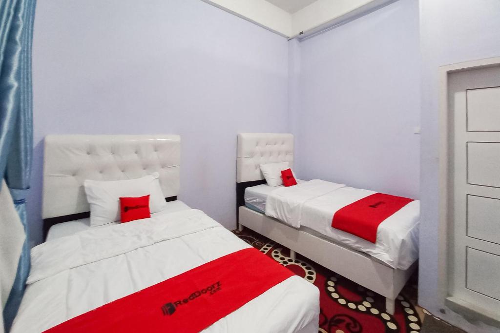 RedDoorz Syariah at Masrun Homestay Bangkinang - Quarto Twin Standard
