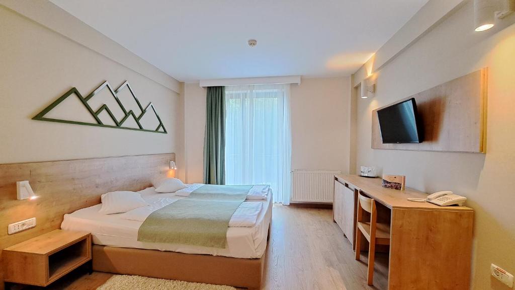 TV a/nebo společenská místnost v ubytování Hotel Kolping