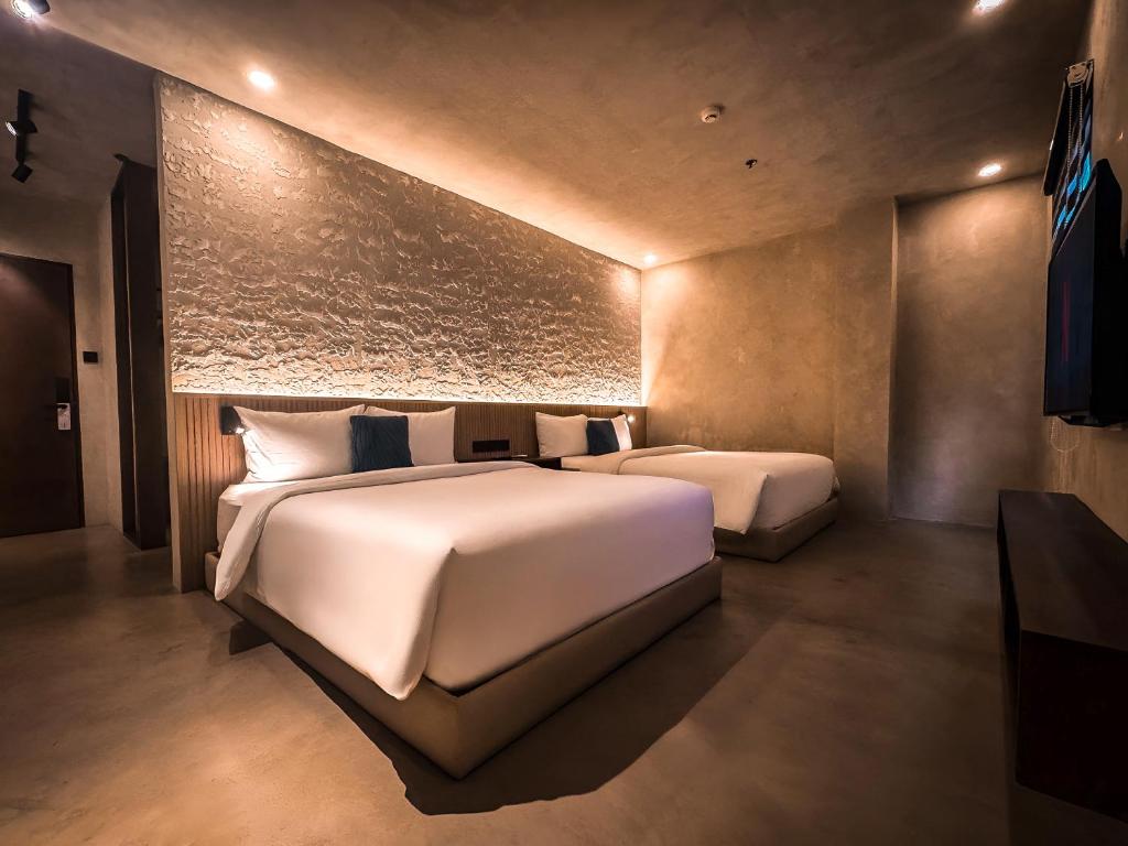 Postel nebo postele na pokoji v ubytování Yamato Hostel