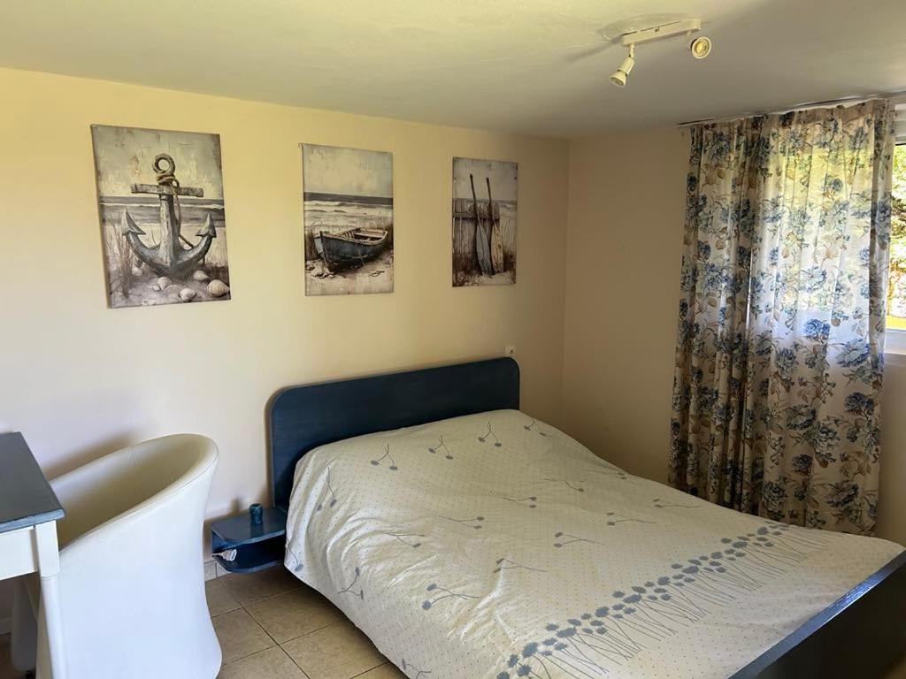 Postel nebo postele na pokoji v ubytování Tiny Comfort House