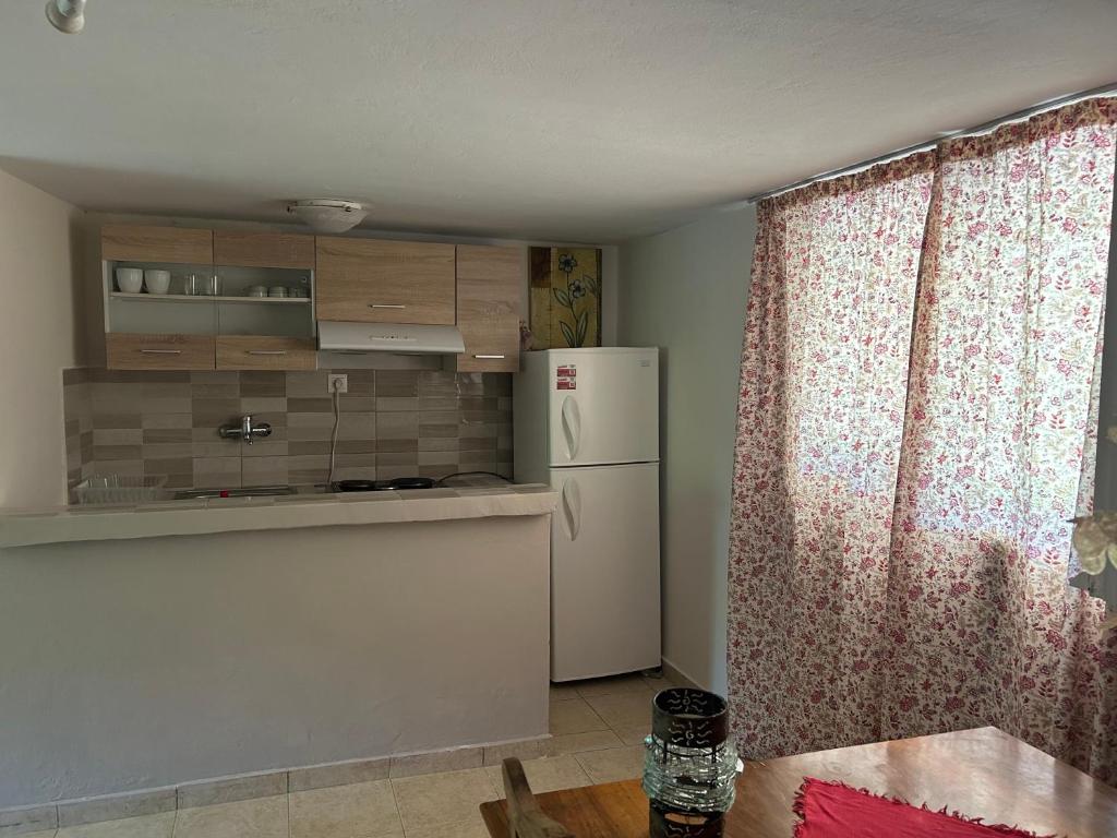 Kuchyň nebo kuchyňský kout v ubytování Tiny Comfort House