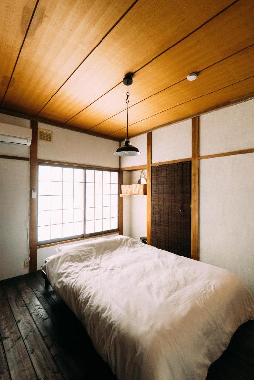Postel nebo postele na pokoji v ubytování guesthouse TANDEM