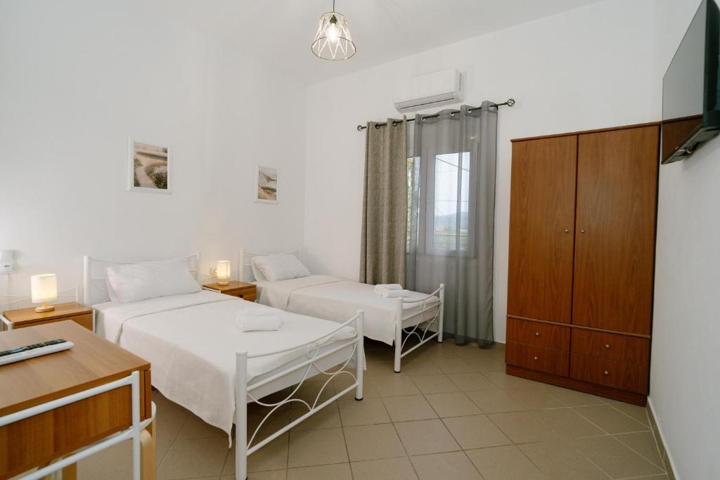 Postel nebo postele na pokoji v ubytování Gima sis