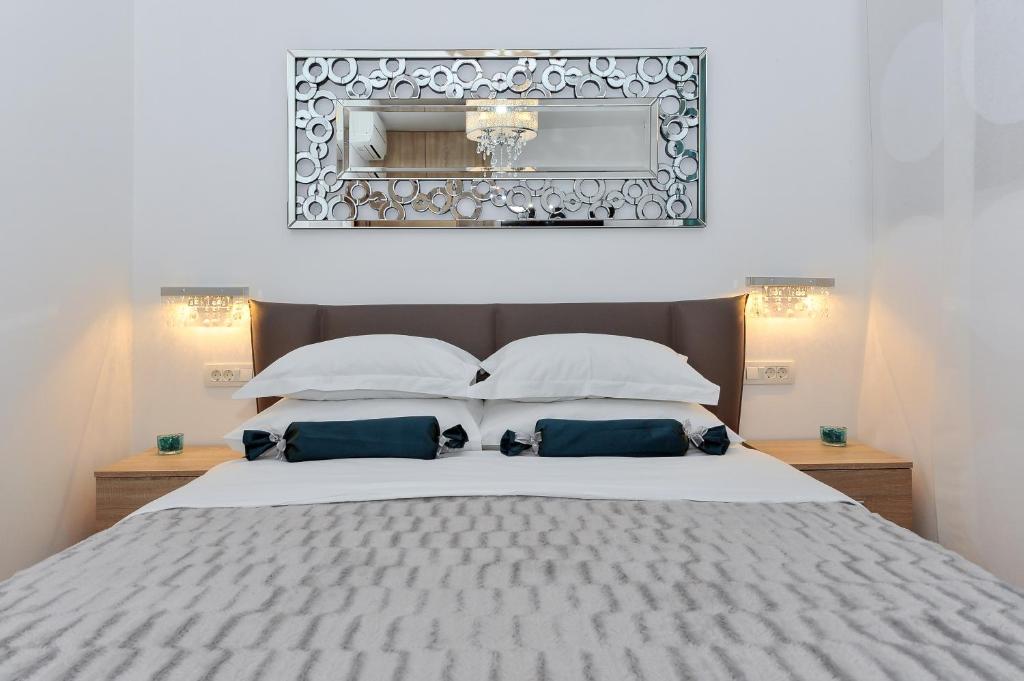 Posteľ alebo postele v izbe v ubytovaní Luka Residence Apartments