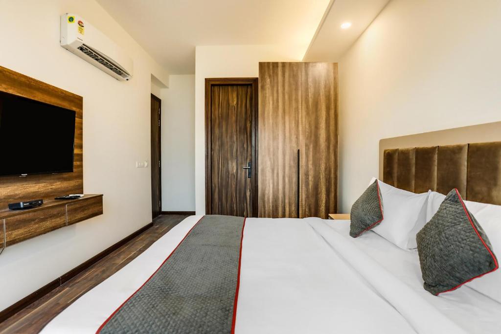 Postel nebo postele na pokoji v ubytování Super Townhouse MA-32