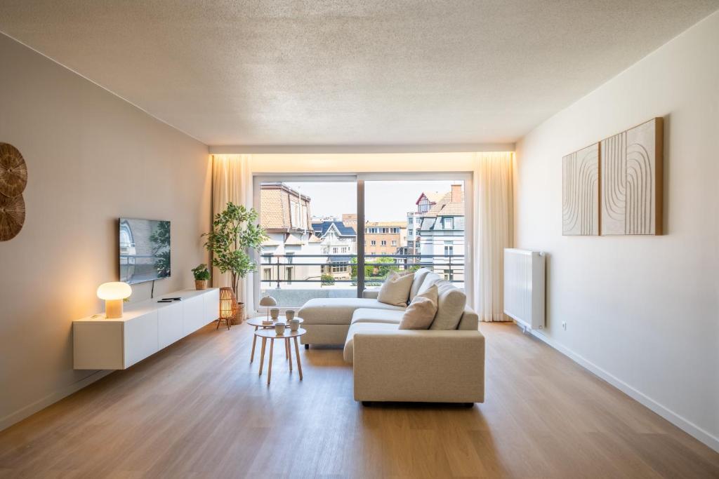 Χώρος καθιστικού στο Beach Escape De Haan Vlakbij Strand met Parking