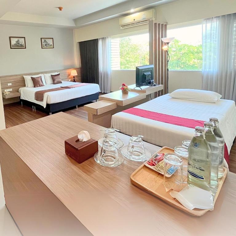 Postel nebo postele na pokoji v ubytování Akelada Hotel