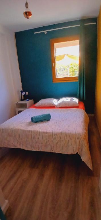 Un ou plusieurs lits dans un hébergement de l'établissement Guest House Yemanja