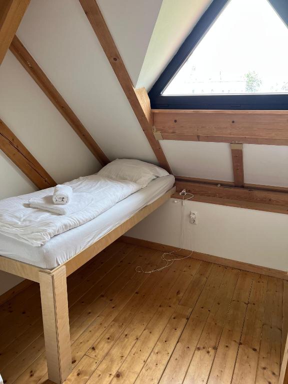 Postel nebo postele na pokoji v ubytování Apartments Steinwänd