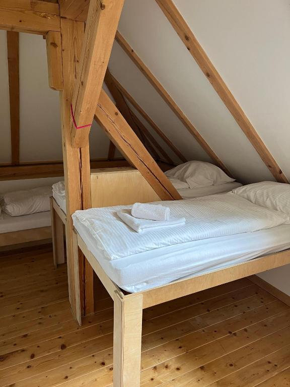 Postel nebo postele na pokoji v ubytování Apartments Steinwänd