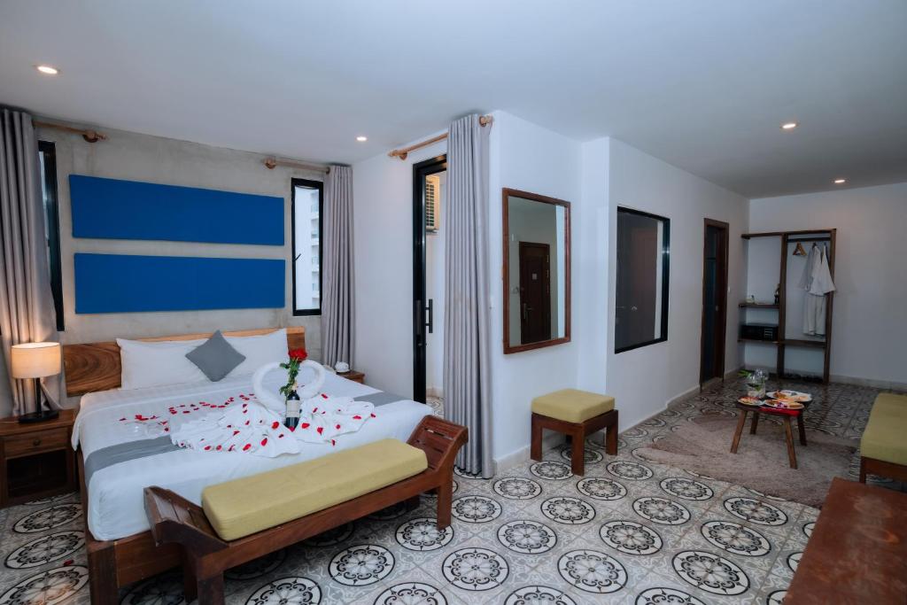 Postel nebo postele na pokoji v ubytování Home Chic Hotel