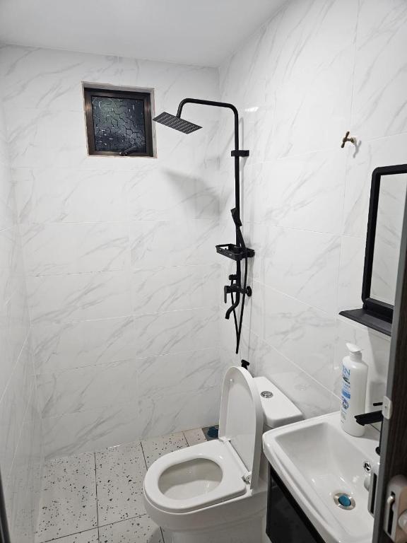 Koupelna v ubytování Adam Homestay