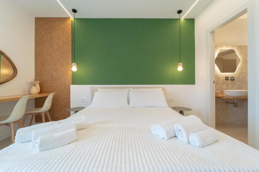 Postel nebo postele na pokoji v ubytování Sophora Guest House Alghero