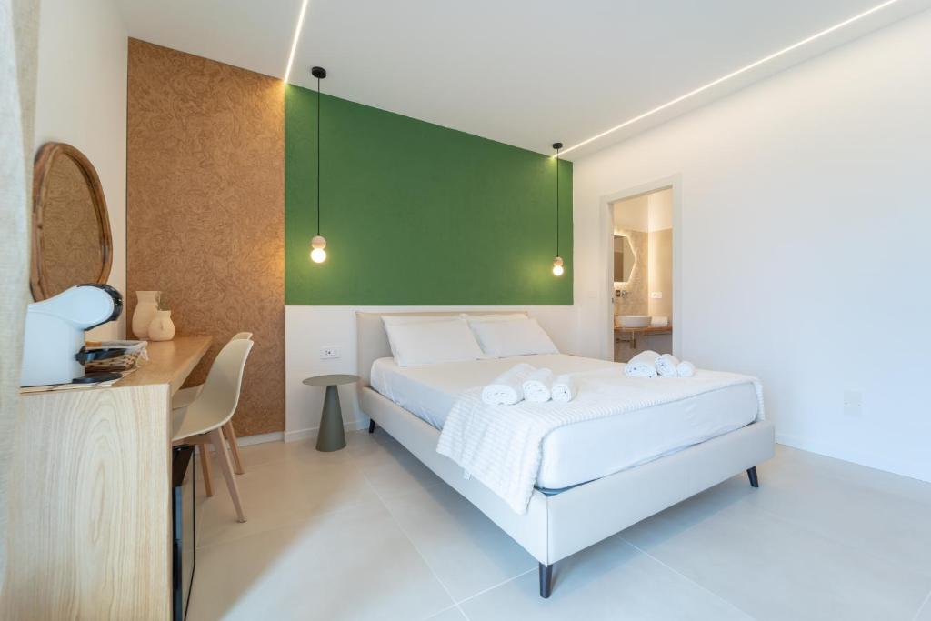 Postel nebo postele na pokoji v ubytování Sophora Guest House Alghero