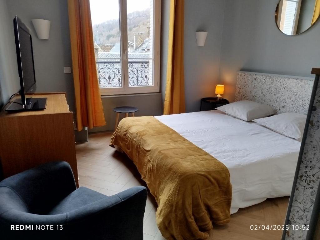 Ένα ή περισσότερα κρεβάτια σε δωμάτιο στο Le Sarciron 152