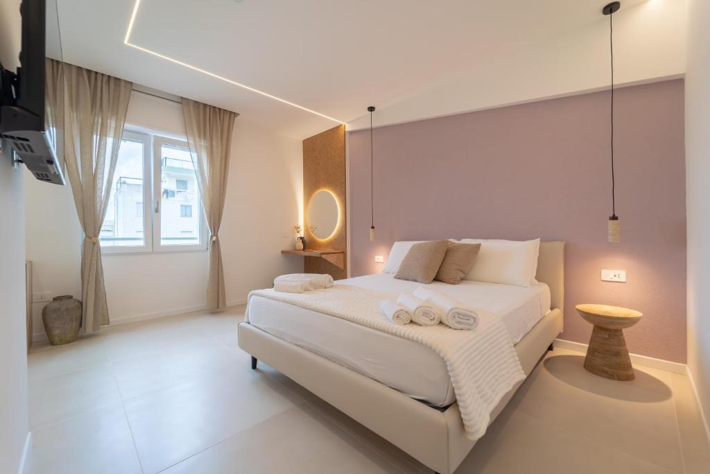 Postel nebo postele na pokoji v ubytování Sophora Guest House Alghero
