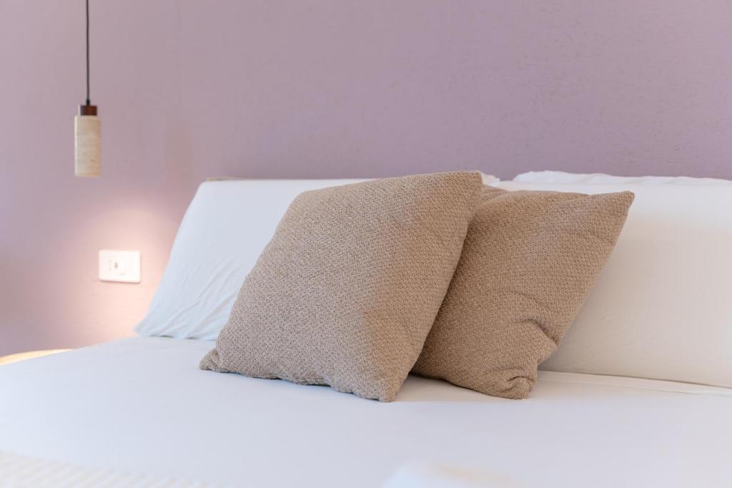 Postel nebo postele na pokoji v ubytování Sophora Guest House Alghero