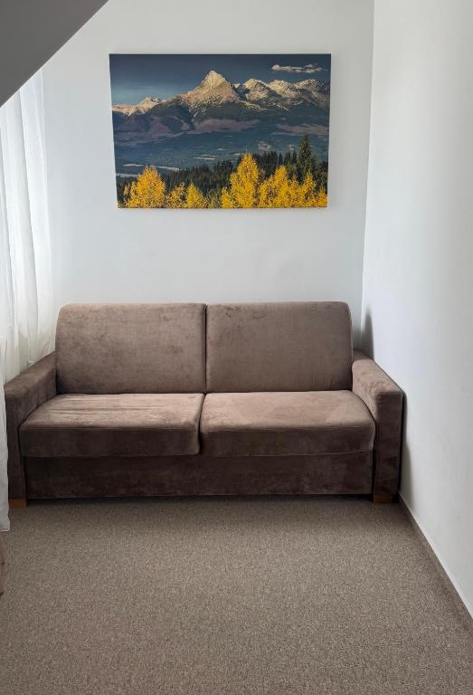A seating area at Chalet Nova Lesna Mountain View