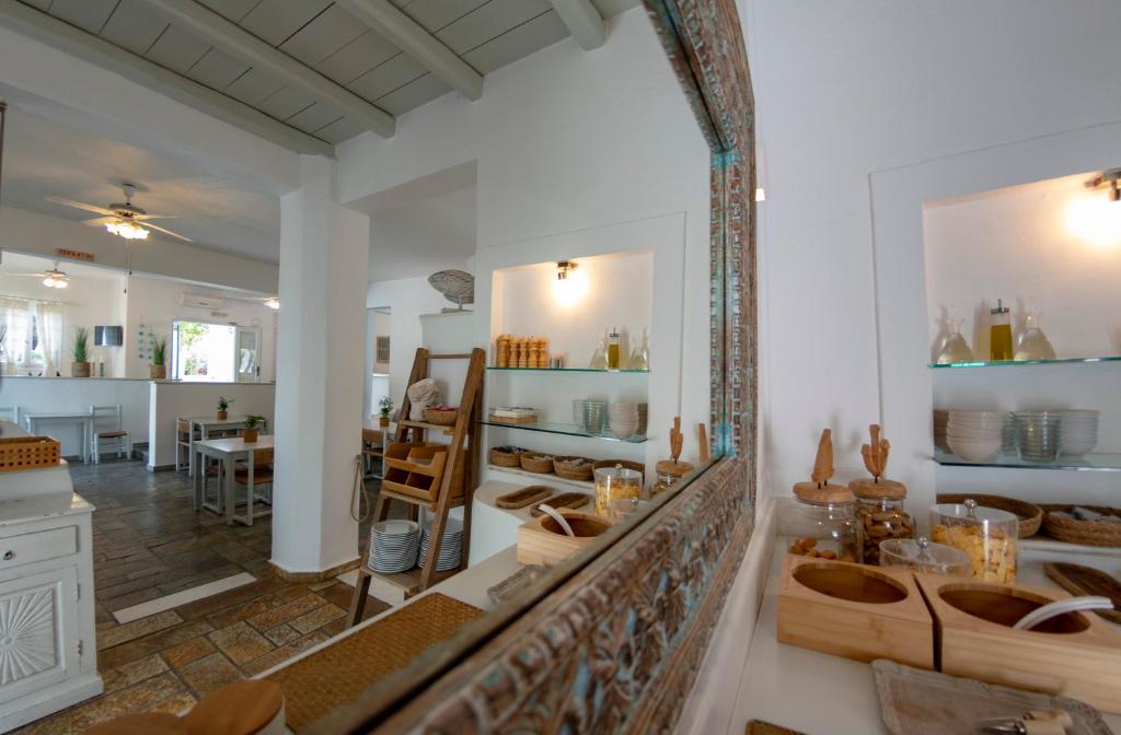 Kuchyň nebo kuchyňský kout v ubytování Hotel Manos