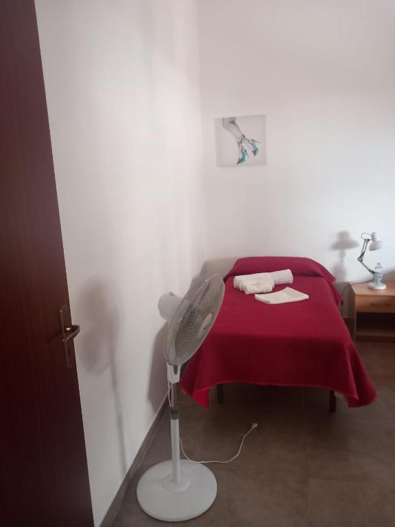 A bed or beds in a room at Silvia's House