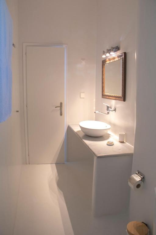 Koupelna v ubytování Hotel Manos
