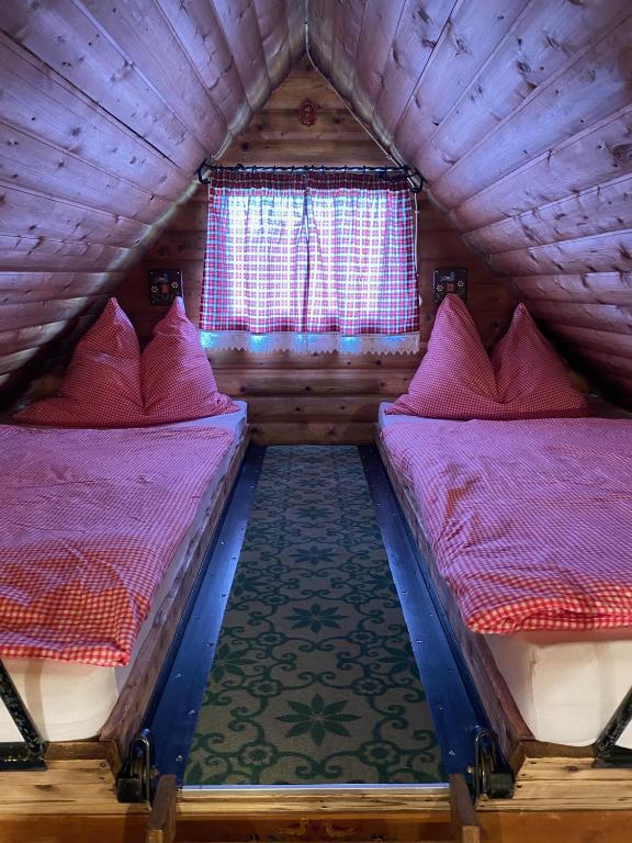 Postel nebo postele na pokoji v ubytování Berghütte Waldheimat