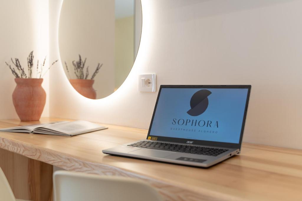 TV a/nebo společenská místnost v ubytování Sophora Guest House Alghero