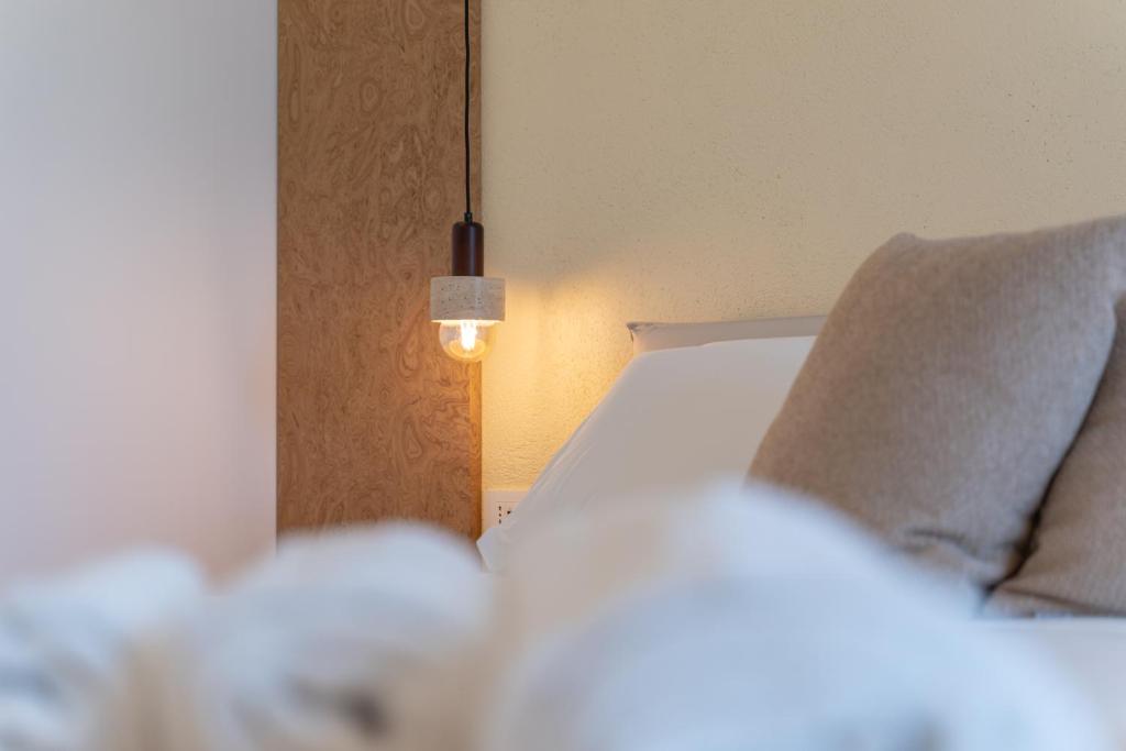 Postel nebo postele na pokoji v ubytování Sophora Guest House Alghero
