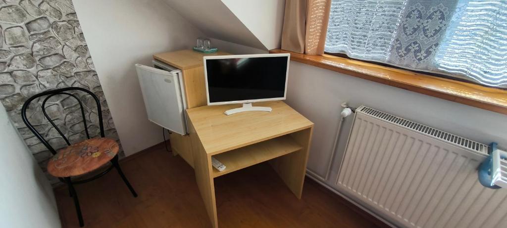 TV a/nebo společenská místnost v ubytování Joós Apartman