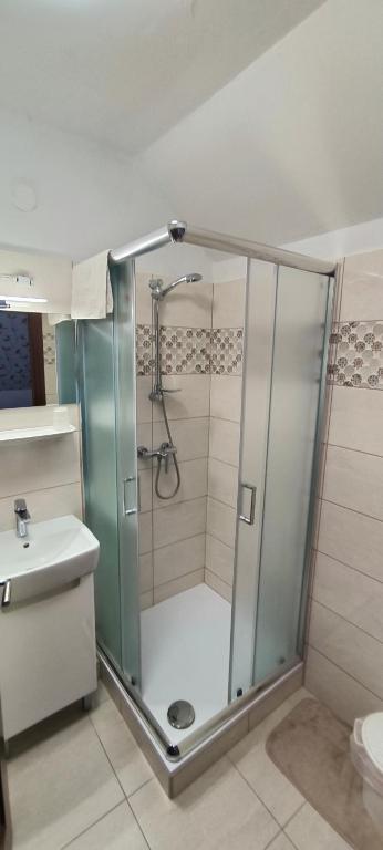 Koupelna v ubytování Joós Apartman
