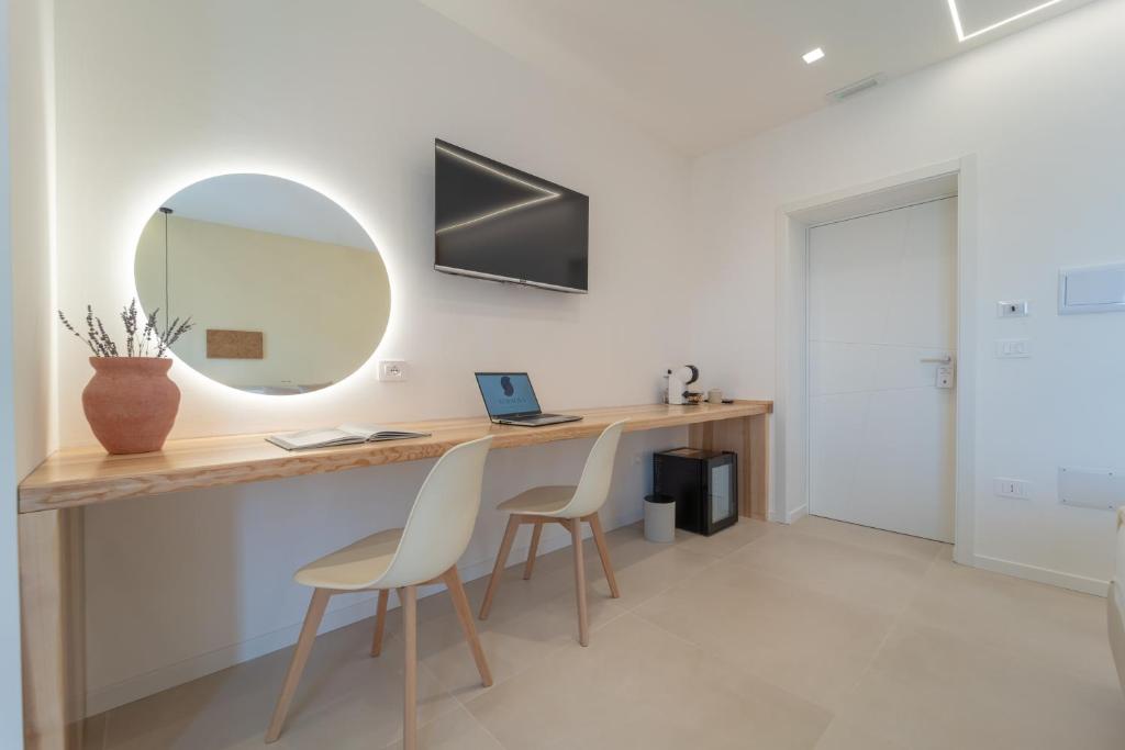 TV a/nebo společenská místnost v ubytování Sophora Guest House Alghero