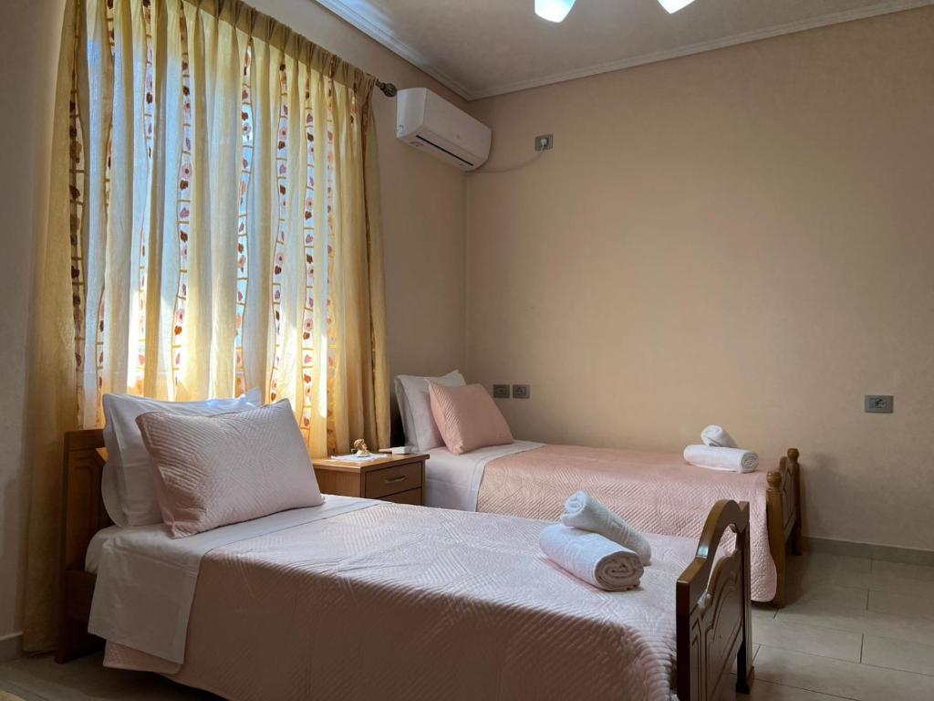 Postel nebo postele na pokoji v ubytování Gogo Apartment