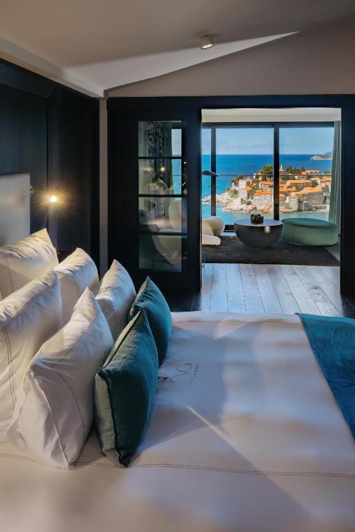 Postel nebo postele na pokoji v ubytování Villa Geba Boutique Hotel