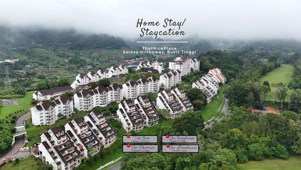 arial view of a resort with white buildings at ThatNicePlace at Selesa Hillhomes, Bukit Tinggi, Genting in Bentong