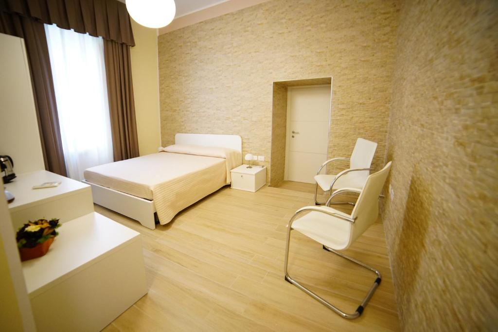 Postel nebo postele na pokoji v ubytování Gattini33