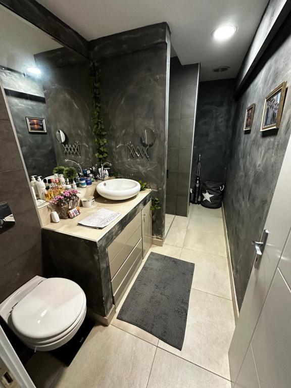 Koupelna v ubytování Penthouse studio Lola New Belgrade
