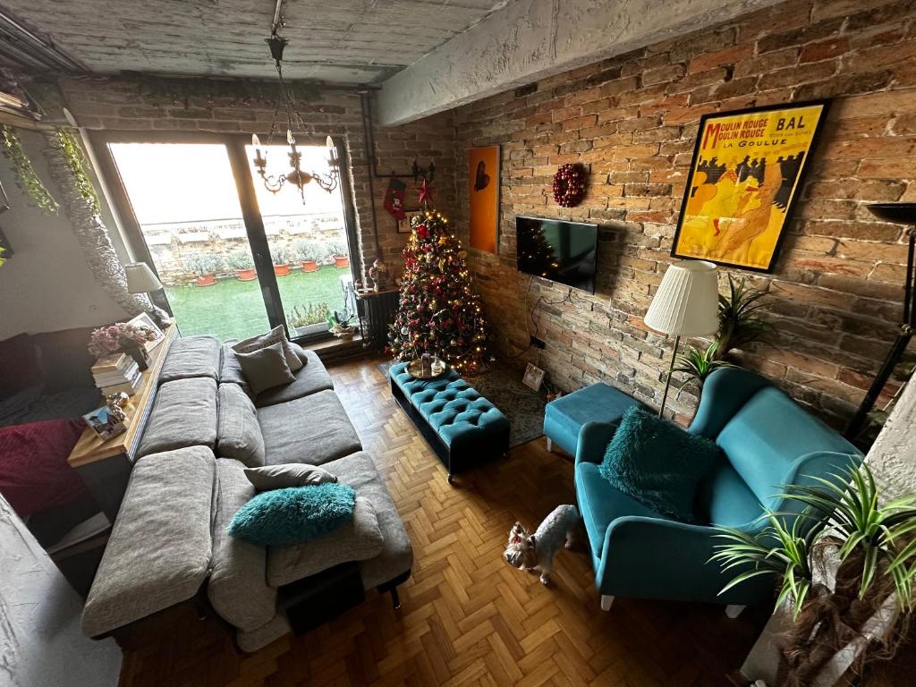 Posezení v ubytování Penthouse studio Lola New Belgrade