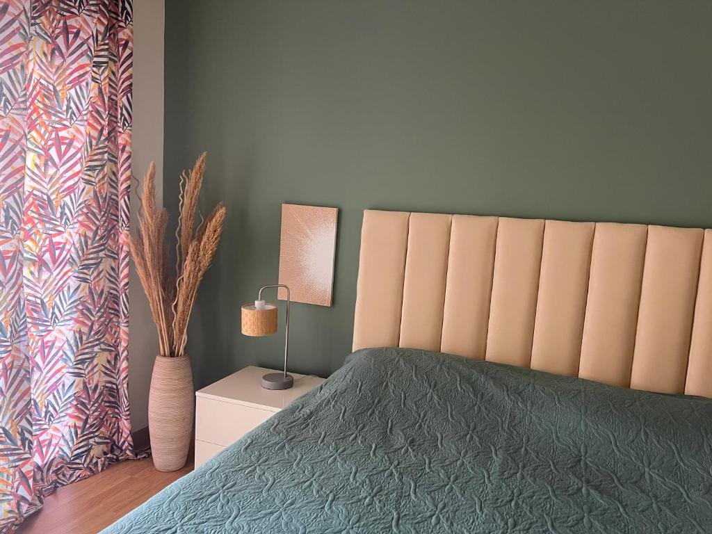 Postel nebo postele na pokoji v ubytování Selini apartment