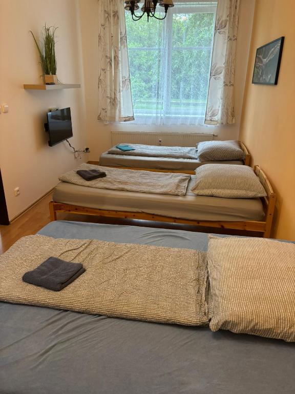 Posteľ alebo postele v izbe v ubytovaní Apartmány Topolová 909B