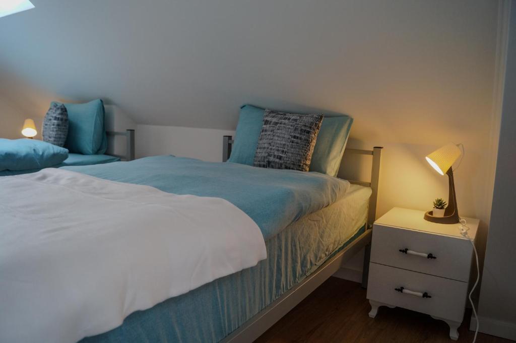 Ένα ή περισσότερα κρεβάτια σε δωμάτιο στο Förde Apartments Kiel